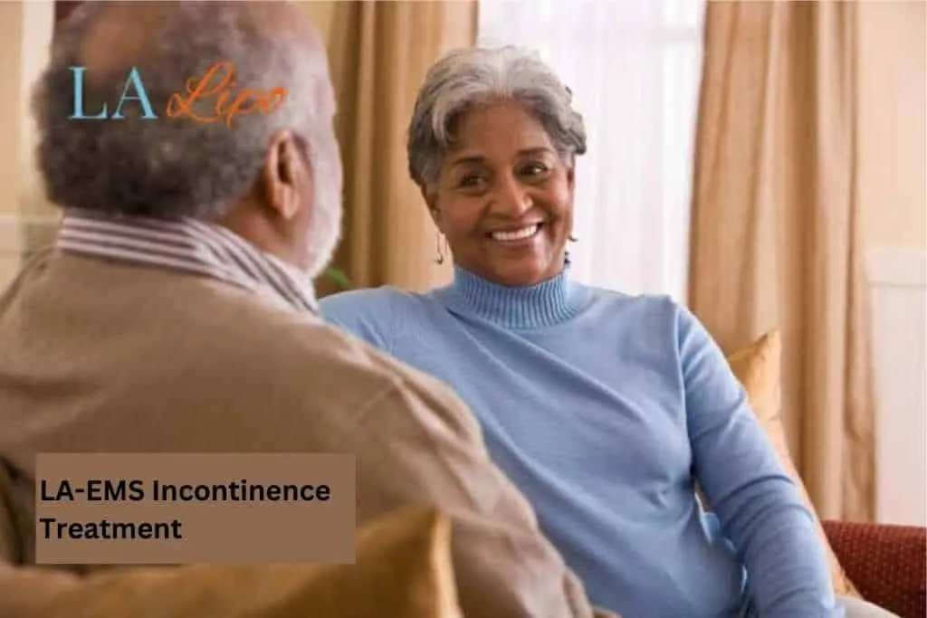 Couple sat smiling at each other - LA-EMS treatment Greater London (Kensington and Chelsea)