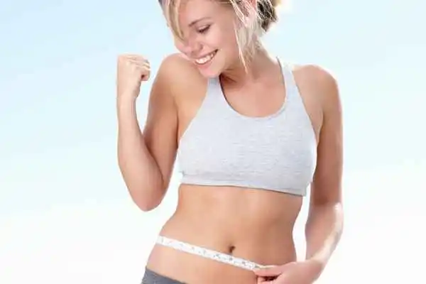 woman happy after fat reduction treatment Greater London (Kensington and Chelsea)