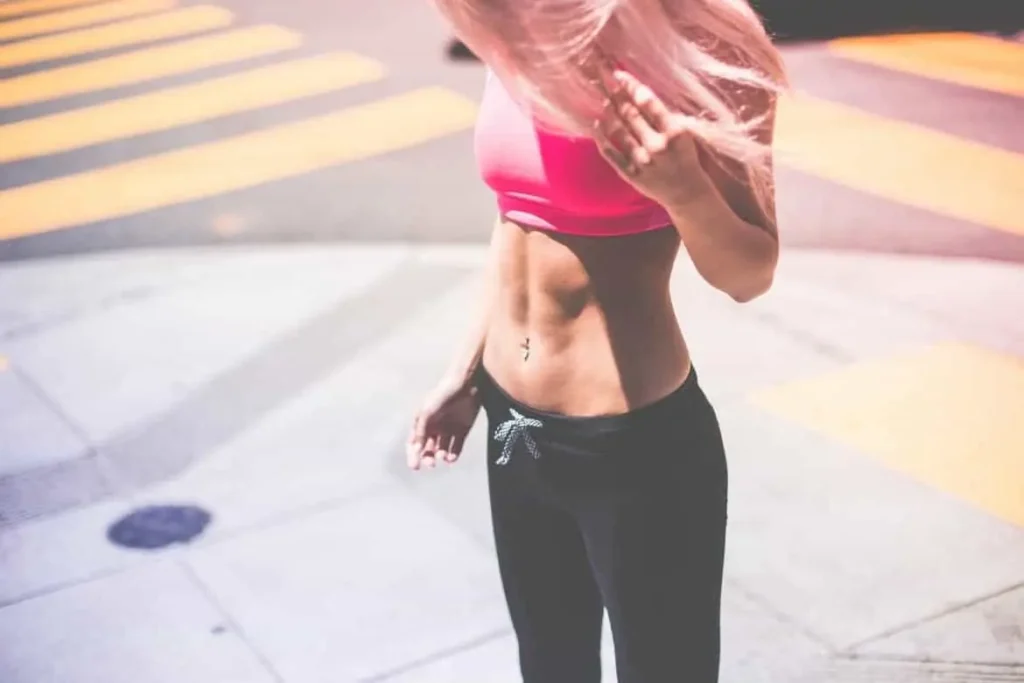 Woman with toned stomach after LA-EMS Body Sculpting Treatment Greater London (Kensington and Chelsea)